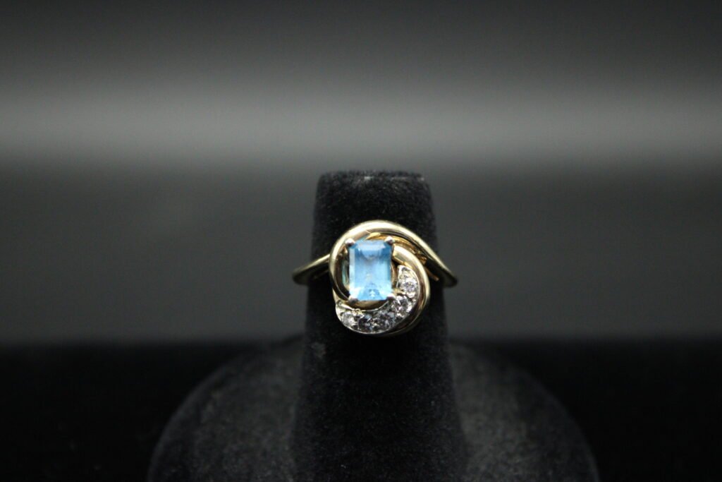 14kt Yellow Gold Emerald Cut Blue Topaz and Diamond Ring