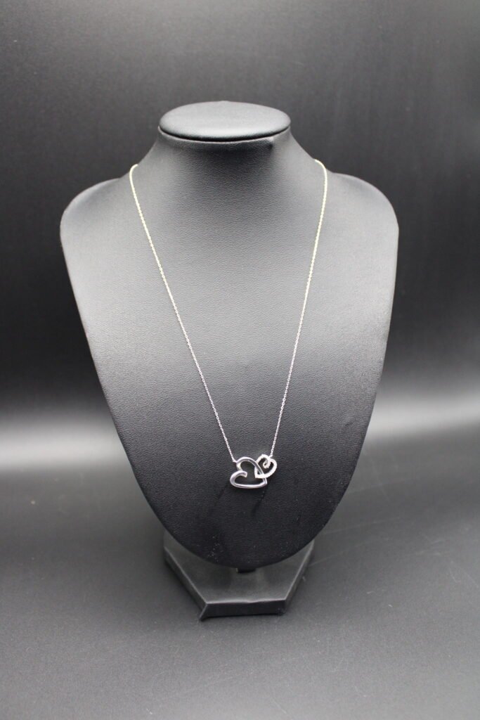 Sterling Silver Necklace with Silver and Diamond Hearts