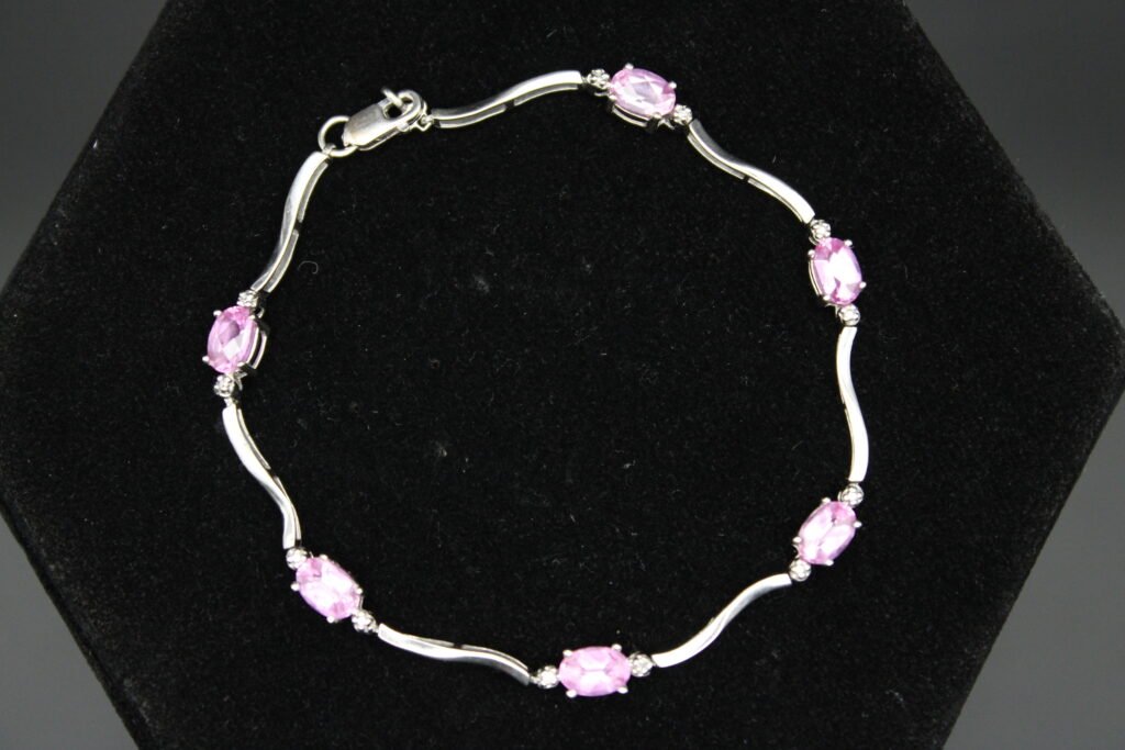 10kt White Gold Pink Sapphire Oval Cut Tennis Bracelet